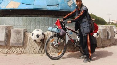 بعد 18 عاما من انطلاقه.. صيني يحط في العراق برحلته حول العالم على دراجته